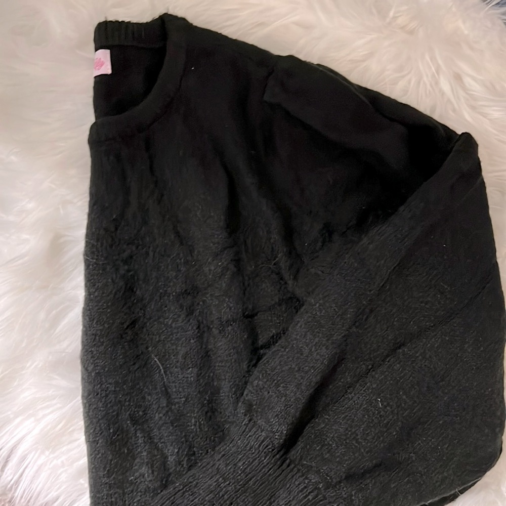 Black sweater, slight puff sleeve